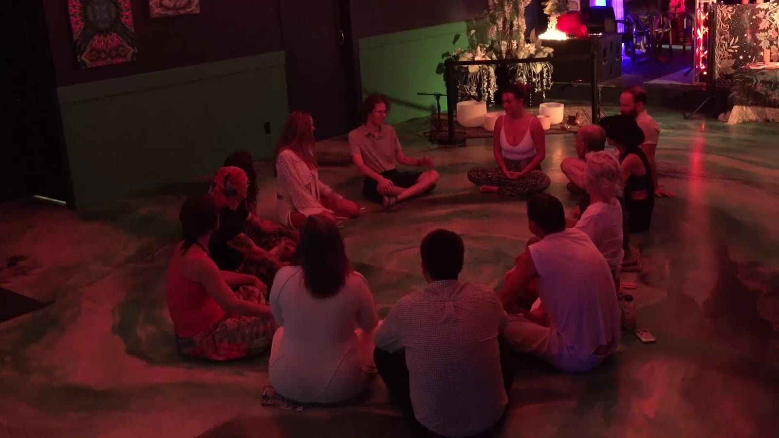 An opening circle at EIR's June night at humankind.